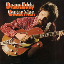 Clouds in shades of blue and gold at sunrise. 